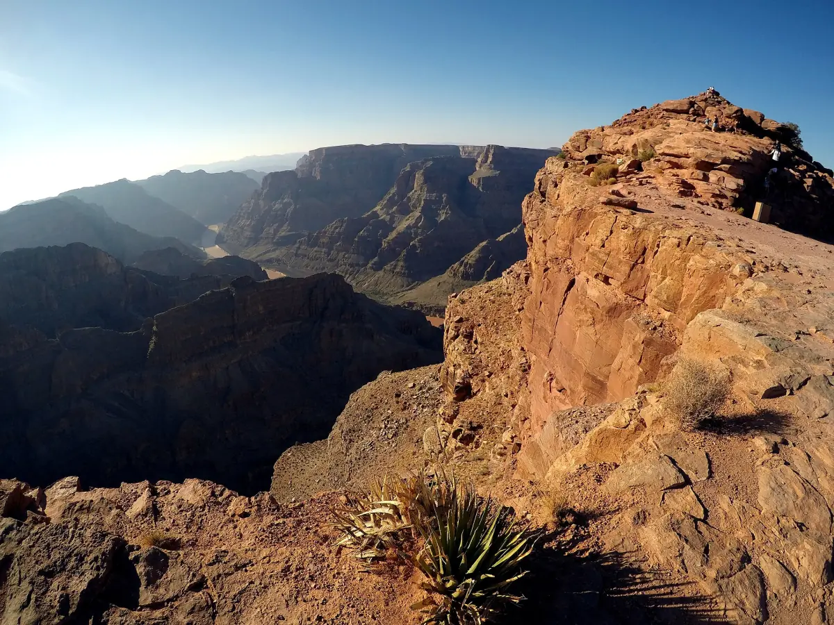 Red sandstone cliff at Guano Point with the canyon and river beyond
