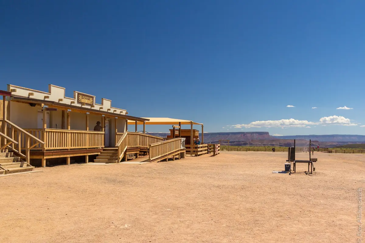 Wooden cabins at Hualapai Ranch standing on dusty desert ground