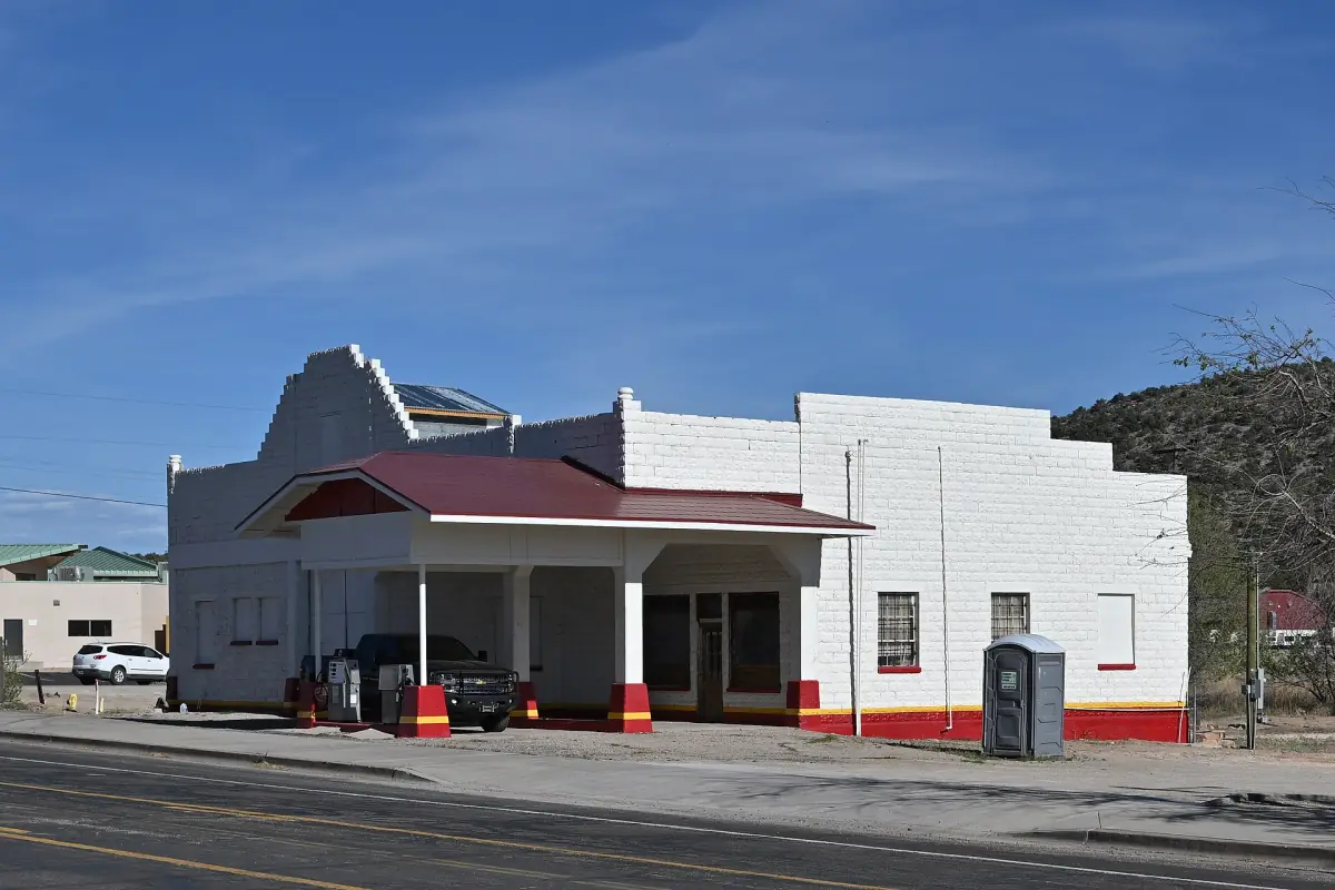 Historic white gas station building on Route 66 in Peach Springs